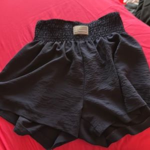 Size medium navy blue shorts.